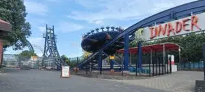 Guests take a whirl on Invader at Rainbow's End